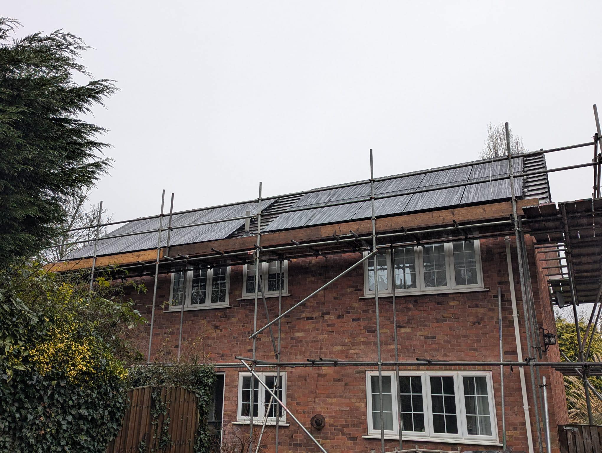 New roof tiles being laid during complete re-roof in Yorkshire